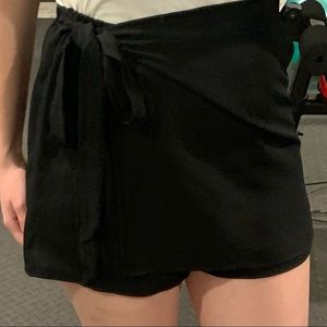 Black skort, wrap skirt over shorts, lightweight polyester